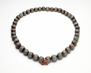 Faience Cylinder and Necklace with Gold, Turquoise and Carnelian Pendant in the Shape of a Shen-Ring, the Sign for Eternity by Middle Kingdom Egyptian